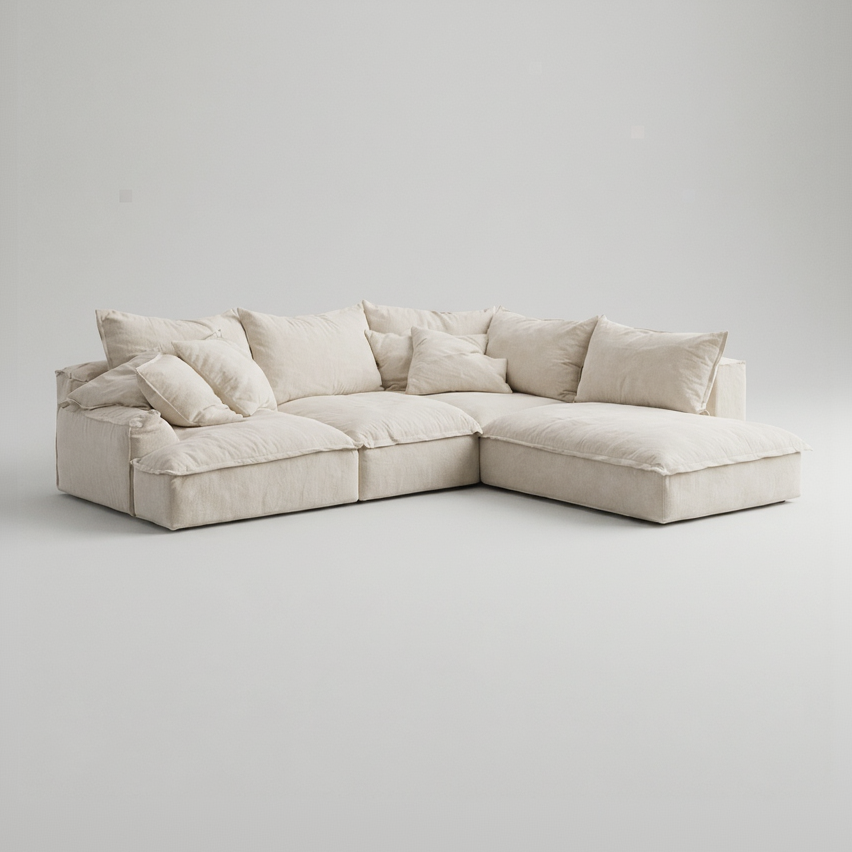 Beige sectional sofa on a plain background